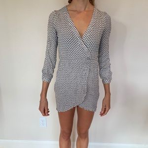 Beige and black pattered mini wrap dress